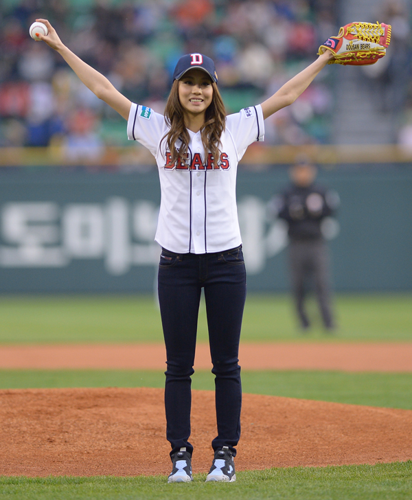 IU throws the opening pitch for the Doosan Bears
